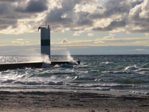 September winds stir up waves around the Pentwater, Michigan, lighthouse. Photo by Barbara Newhall