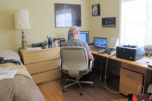 A 2015 home office with desk, computers, printer, photos and guest bed. Photo by Barbara Newhall