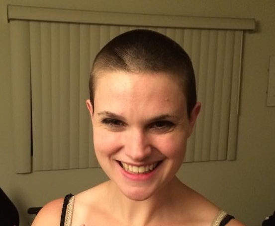 A pretty girl, Christina Newhall, has shaved off all her hair and is still pretty. Photo by Tim Beedle