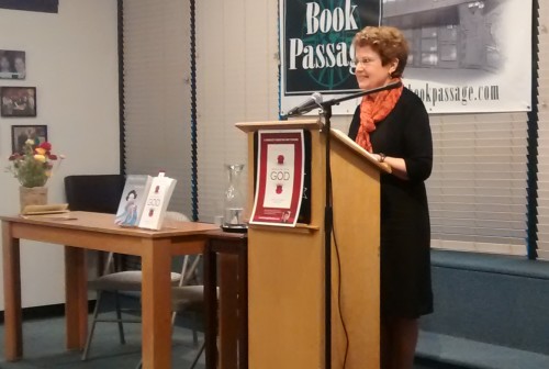 Barbara Falconer Newhall, author of "Wrestling with God: Stories of Doubt and Faith," reads from her book at the podium of the Book Passage Bookstore, Corte Madera, CA, April, 2015. Photo by Cheryl McLaughlin