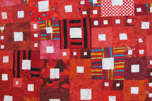 Displayed at the East Bay Heritage Quilters show "Voices in Cloth 2016" quilt show in Richmond, CA.. a detail of "Hopscotch," by Susan Fuller. Photo by Barbara Newhall.