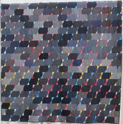 On display at the East Bay Heritgage Quilters show "Voices in Cloth 2016" in Richmond, CA. , a grey-blue quilt made of suiting material, "Suits," by Arleen Kukua. Photo by Barbara Newhall 