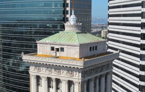 the view from the Oakland Tribune Tower. In the foreground, the Bank of America Building. In the background, the 1111 Broadway and the Clorox Building. In the distance, the Bay Bridge. Photos by Barbara Newhall
