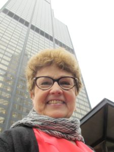 Author Barbara Falconer Newhall before the Willis Tower, Chicago. Photo by Jon Newhall
