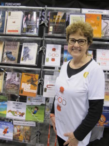 Barbara Falconer Newhall's prize-winning book "Wrestling with God," got good display at the Foreword Reviews new titles display in the main showroom at Book Expo America 2016. Photo by Jon Newhall