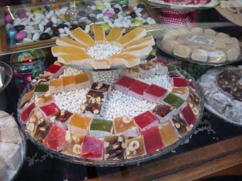 Squares of Turkish delight candy colorfully arranged in a shop window along the pedestrian shopping street İstiklal Caddesi in Istanbul. Photo by Barbara Newhall
