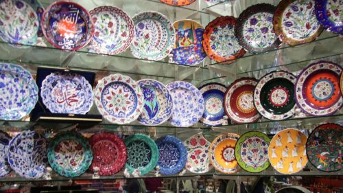 The walls of a shop along the pedestrian shopping street İstiklal Caddesi in Istanbul are lined with handpainted ceramic plates from Turkey. Photo by Barbara Newhall