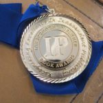 Book contests. An IPPY gold medal awarded to Wrestling with God, by Barbara Falconer Newhall, 2016. Photo by Barbara Newhall