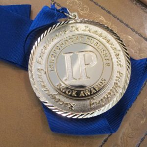 Kudos for Wrestling with God. Book contests. An IPPY gold medal awarded to Wrestling with God, by Barbara Falconer Newhall, 2016. Photo by Barbara Newhall