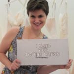 Christina Newhall says yes to the dress. Her wedding dress -- with a sign from the Nordstrom store. Photo by Barbara Newhall
