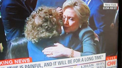 In a TV shot, Hillary Clinton hugs a supporter following her gracious concession speech, 2016. I'm inspired by Hillary. I'm going to stop bad-mouthing Donald Trump. Photo by Barbara Newhall