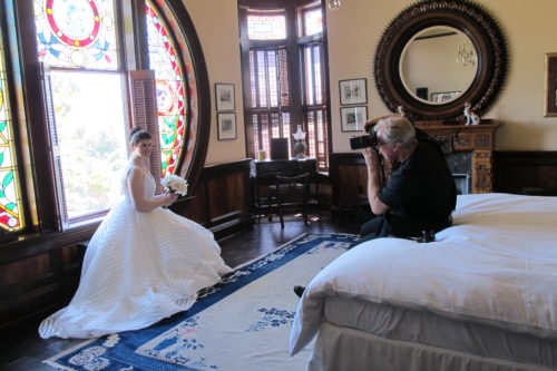 The bride was beautiful. Photographer Asgeir at working taking photos of the bride before the wedding. Photo by Barbara Newhall