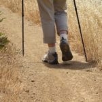 The back of a hiker's boots, on the trail. Photo by Barbara Newhall