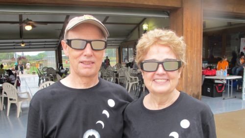 A totality disappointment: Jon and Barbara Newhall sport eclipse viewing glasses and snazzy eclipse T-shirts for the total solar eclipse in St. Joseph, MO, August, 2017. Barbara Newhall photo