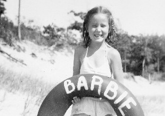 Introducing Barbara Falconer Newhall's new mobile-friendly website with pic of Barbara at age 8 with new nner tube on the beach. Photo by Tinka Falconer