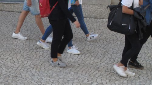 White sneakers with jeans or leggings were de rigueur on the streets of Lisbon, Portugal. Photo by Barbara Newhall
