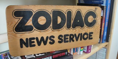 Office romance in the '70s. The logo of the 1970s alternative news service, Zodiac News Service, founded by Jon Newhall. This sign hung in Zodiac's office on Howard Street, San Francisco. Photo by Barbara Newhall