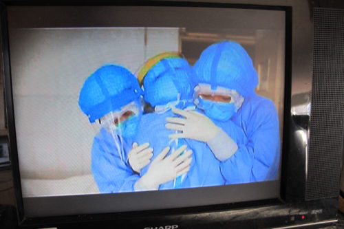 hugging hospital workers