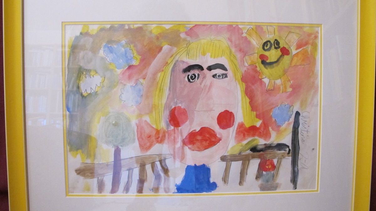 child's-drawing-of-a-girl-with-yellow-hair hanging pictures