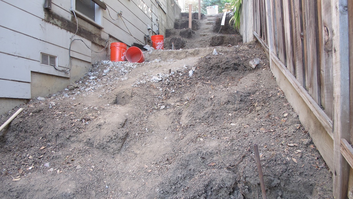 transforming a side-yard-cleared-for-renovation