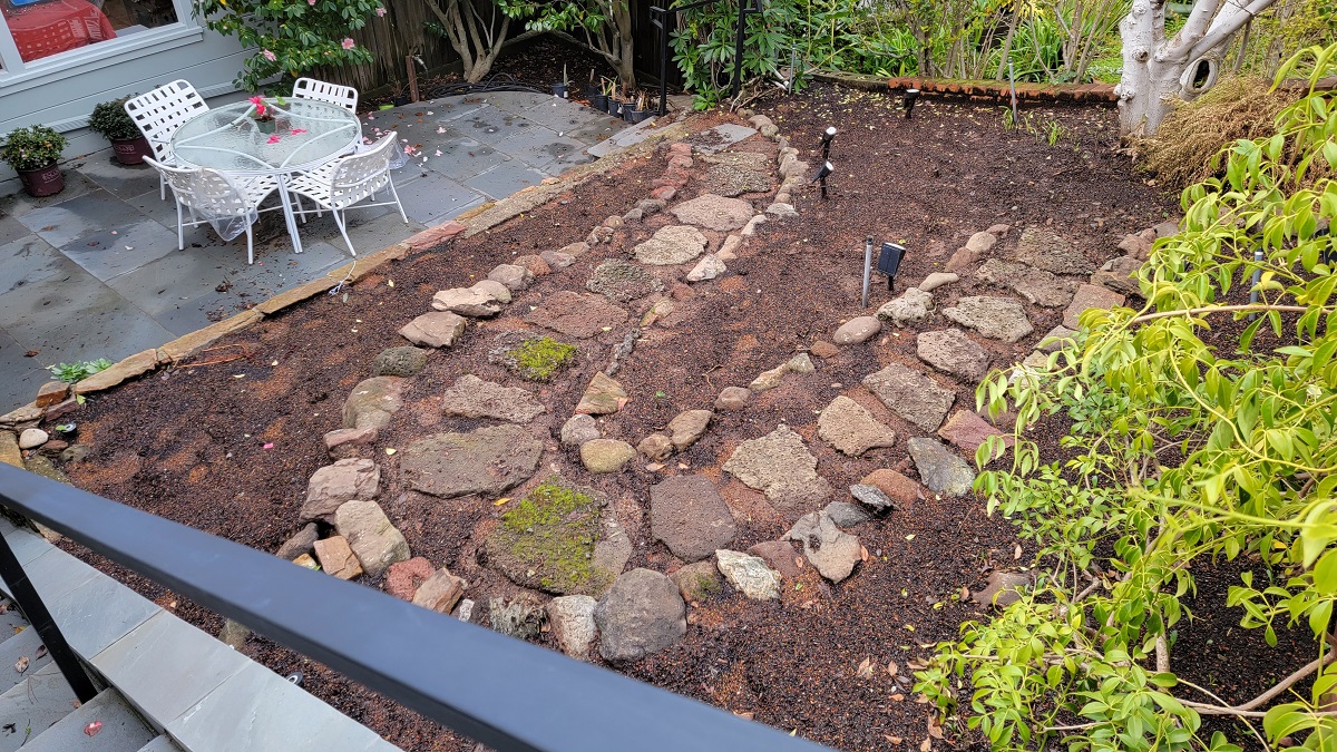 new year's resolution -- do less, including redoing my rock-path-garden