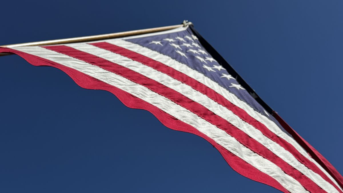 happy birthday us of a. 250 American-flag-flying-against-the-sky-250